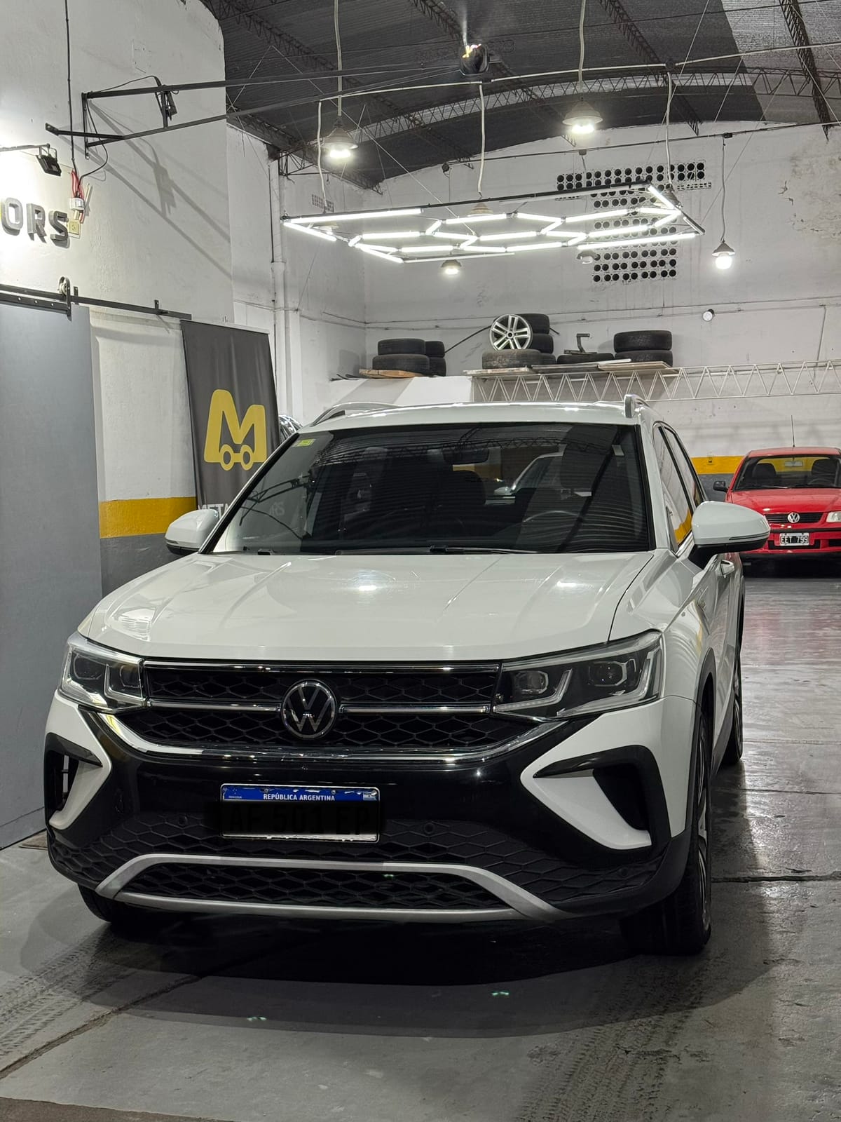 Volkswagen Taos Highline 250 TSI — foto 1